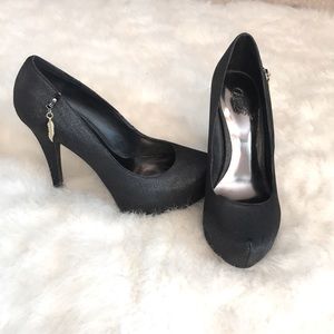 Carlos Santana heels